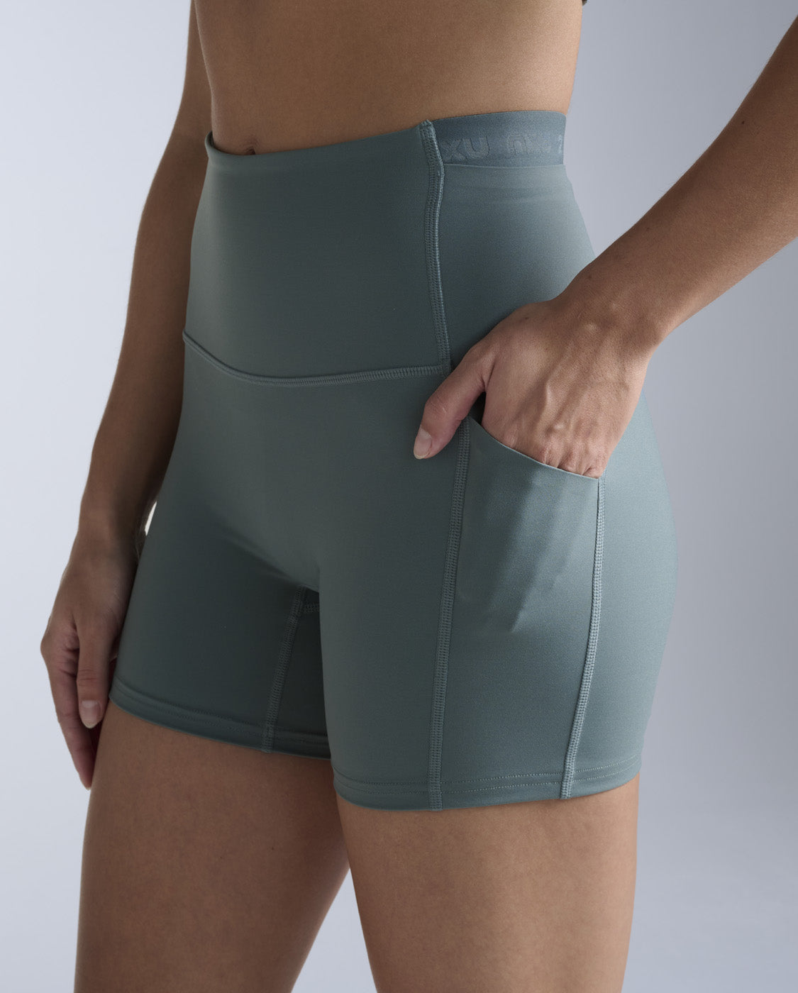 2xu-form-stash-hi-rise-compression-shorts-olive-4-inch image 3