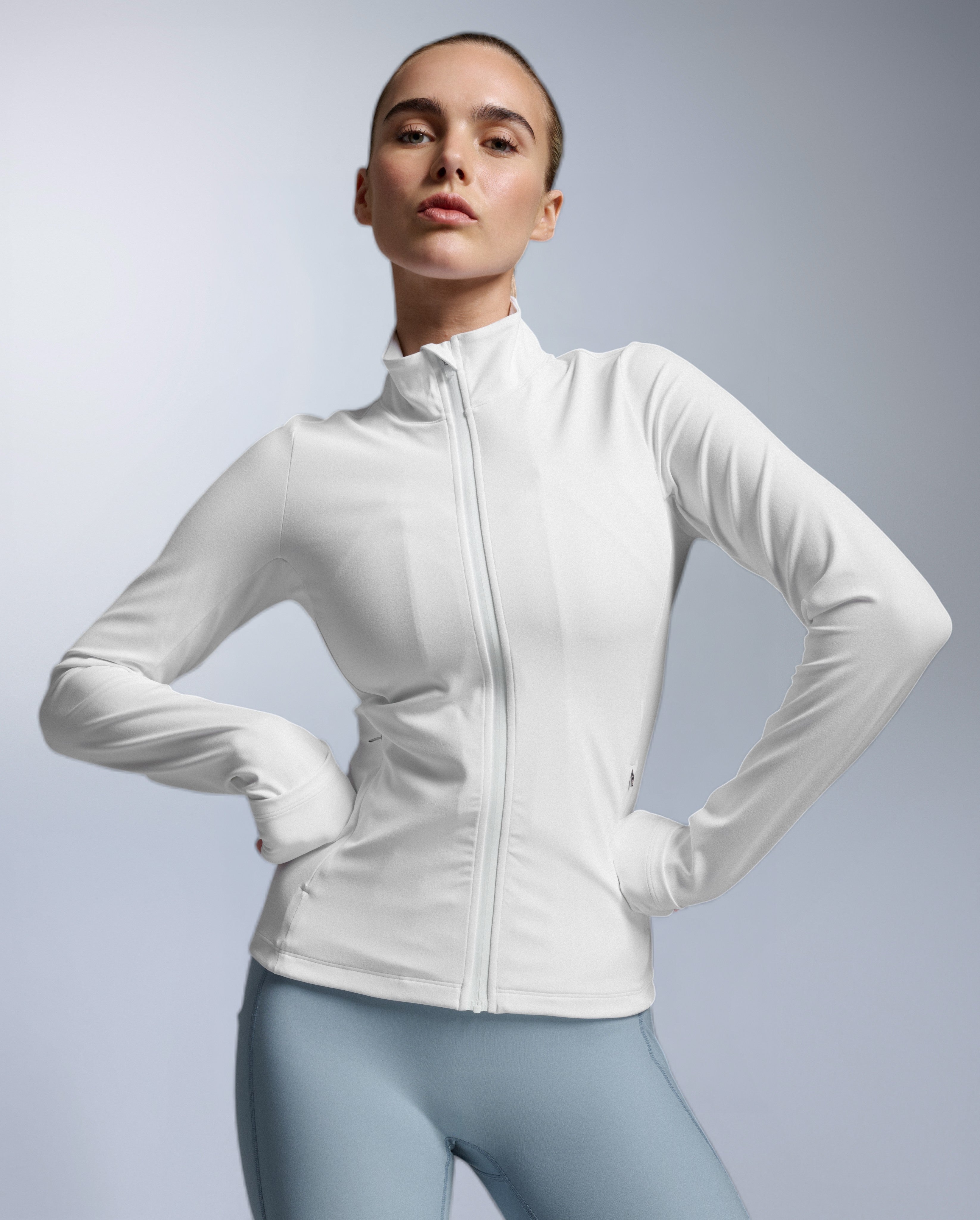 2xu-fluid-full-zip-jacke-damen-wei-winddicht image 1