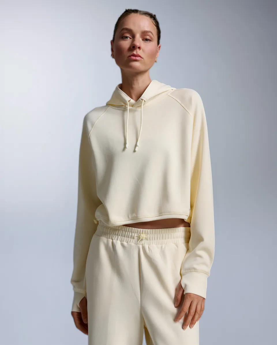 2xu-signature-wonderluxe-cropped-hoodie-chalk-white image 1