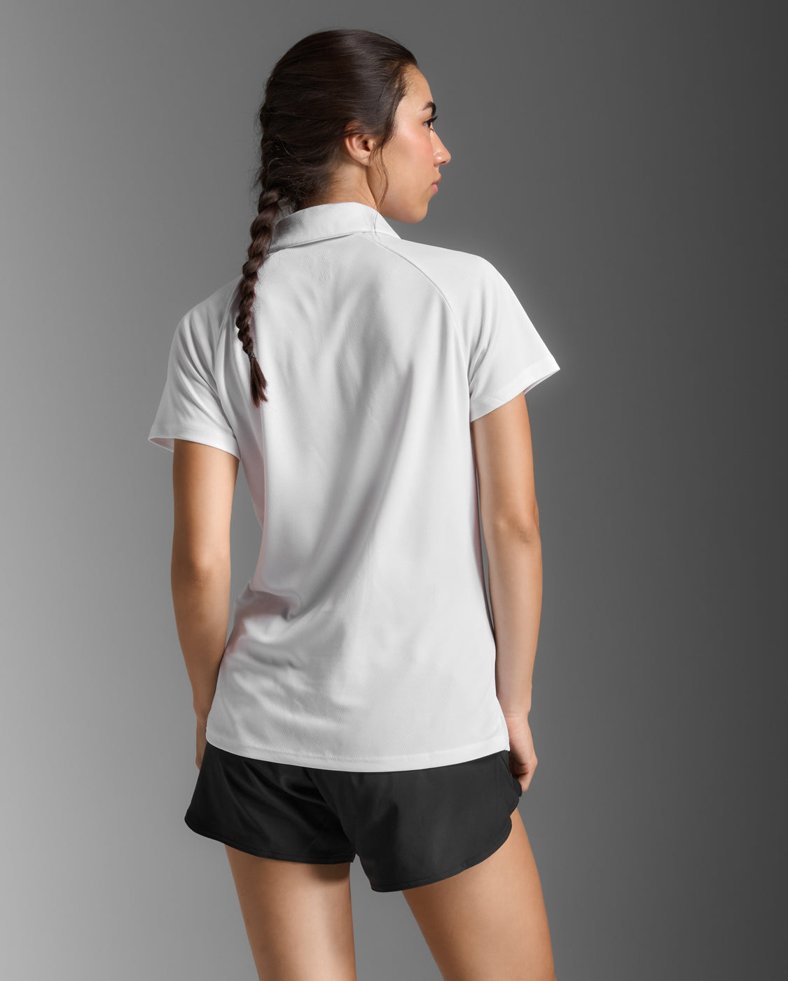 2xu-motion-aspire-polo-poloshirt-damen-wei-kurzarm image 3