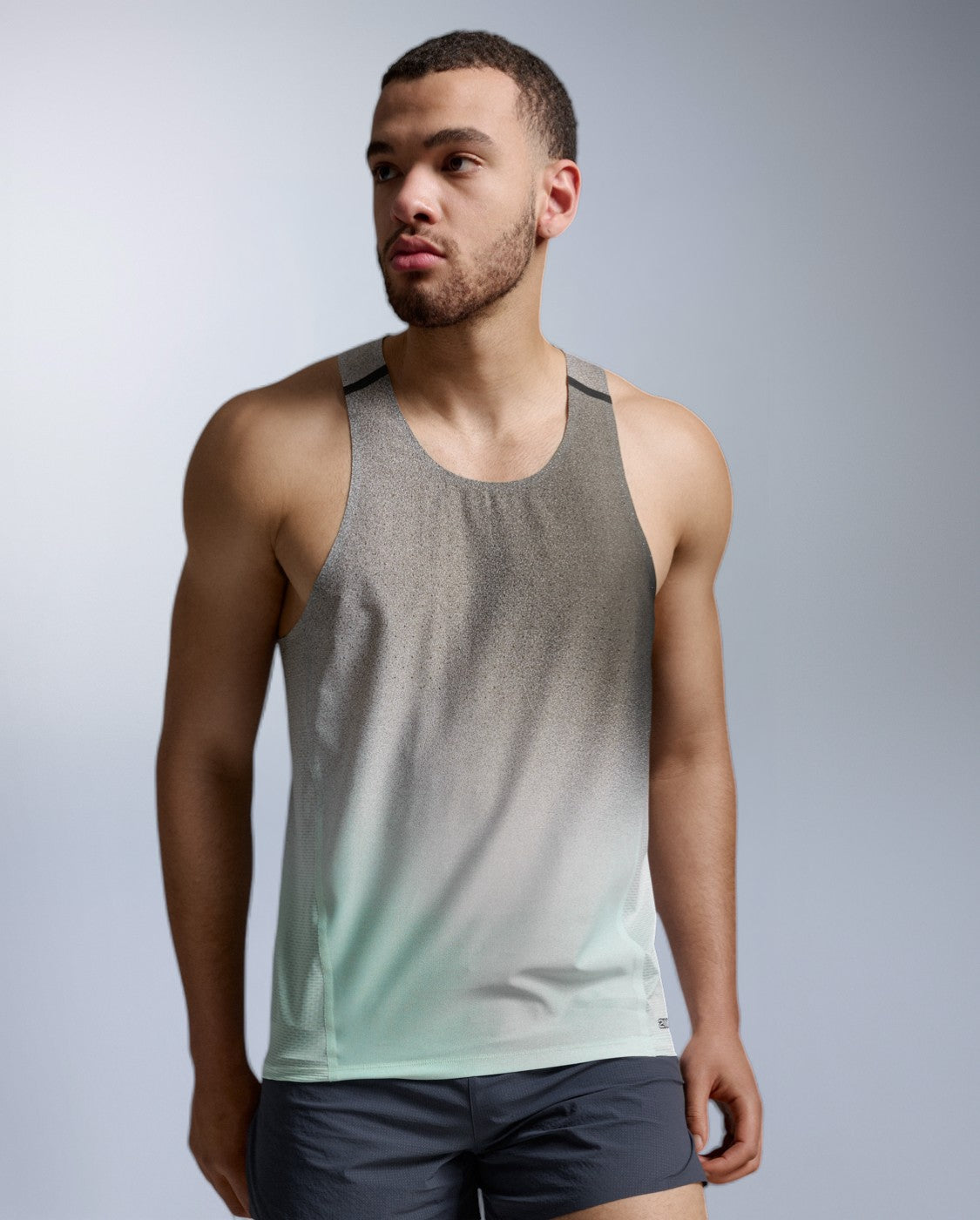2xu-light-speed-react-singlet-herren-lagoon-blast-rmellos image 1